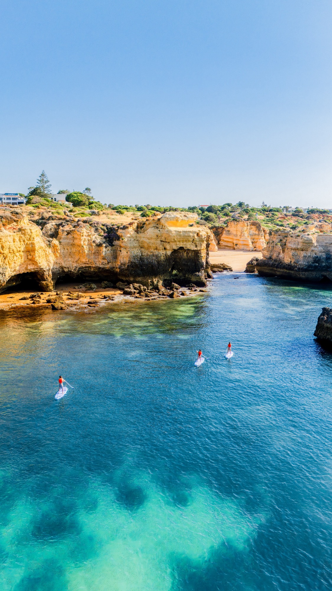 SUP paddleboard Algarve cliffs